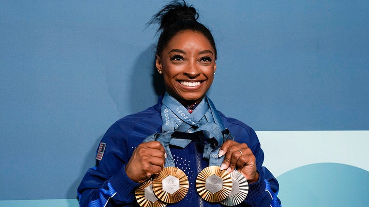 Simone Biles Claims Paris Club Tried to Charge Her $26,000 for a Champagne Bottle