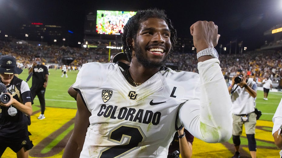 Shedeur Sanders parties with ‘a million’ dollars in Louis Vuitton case after finally being picked in NFL Draft