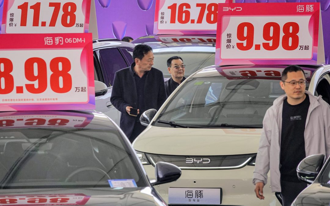 China’s EV price war is heating up. What’s behind the big discounts?