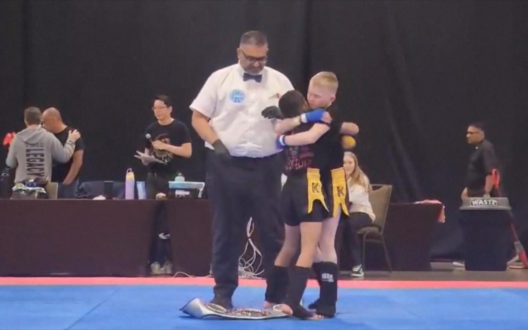 WATCH: ‘Like a man’: Young kickboxers share heartfelt hug