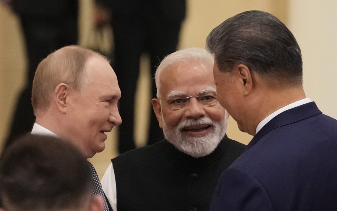 Behind the smiles with Putin, Modi and Xi at China summit