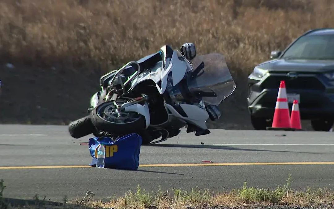 Tesla crashes into CHP motorcycle officer, ejecting him from bike, causing I-280 backup