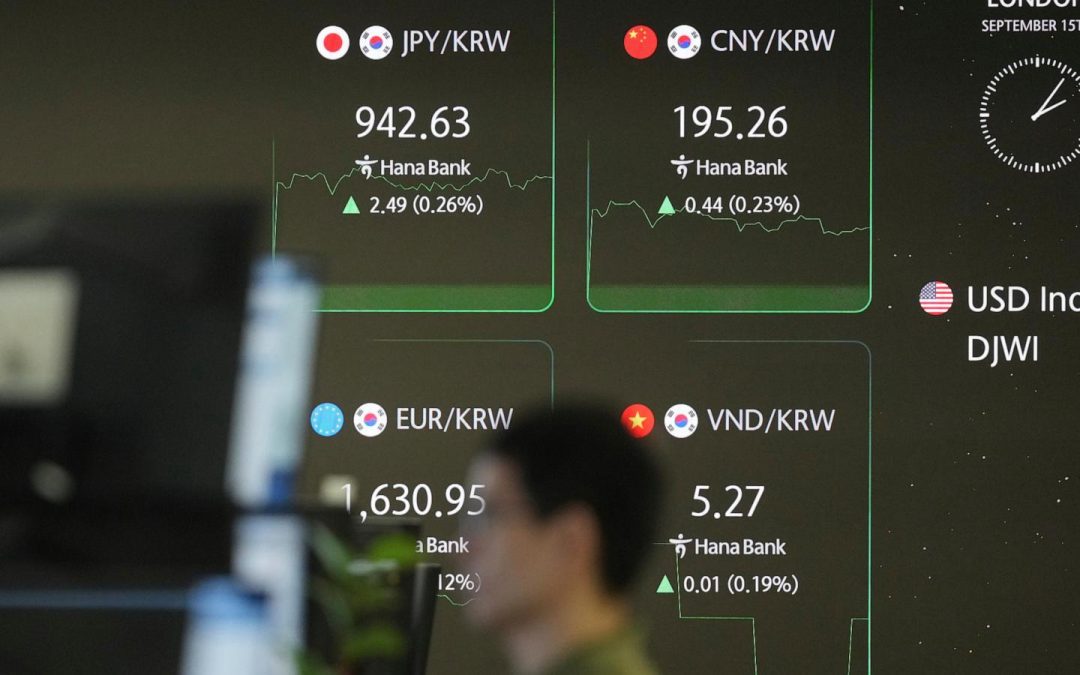 Global shares trade mixed as markets eye Fed decision
