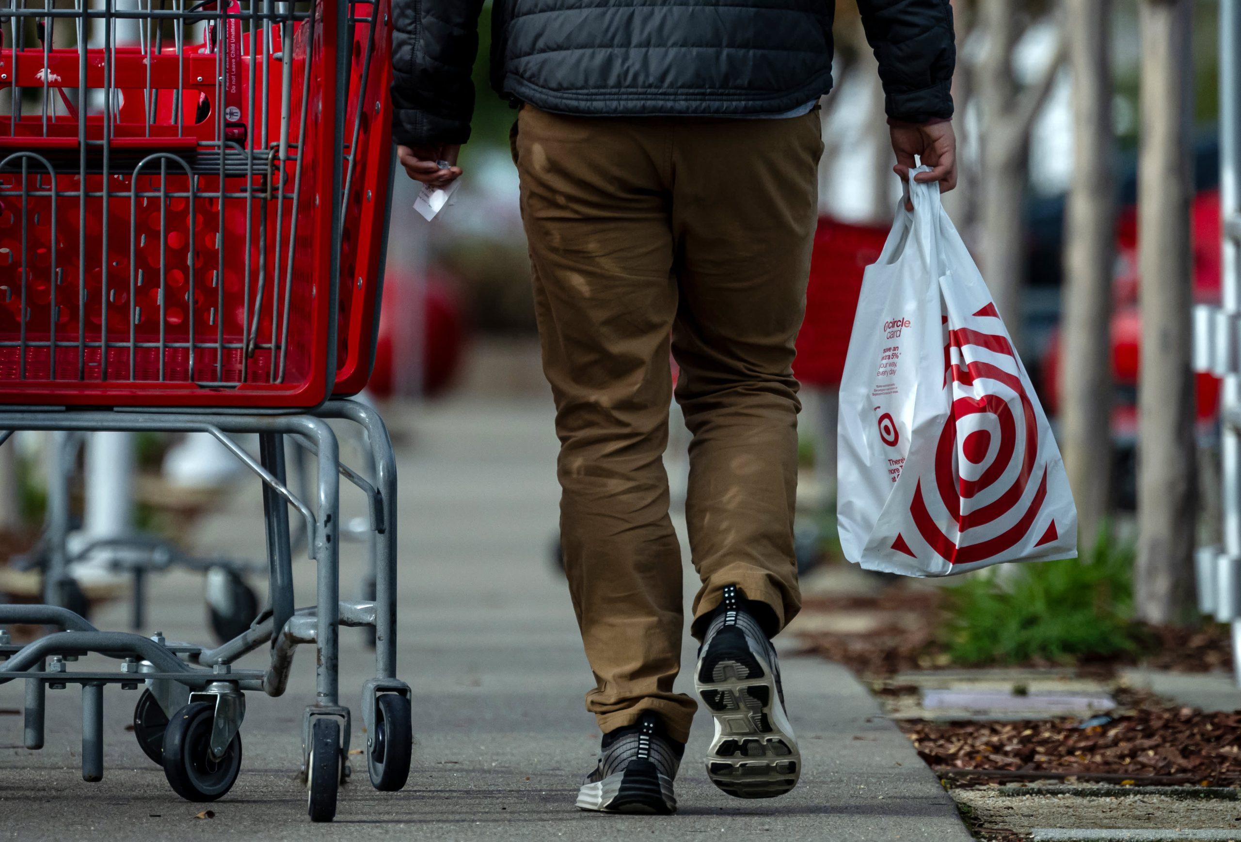 Target cuts profit outlook as shoppers look for deals, make fewer store trips