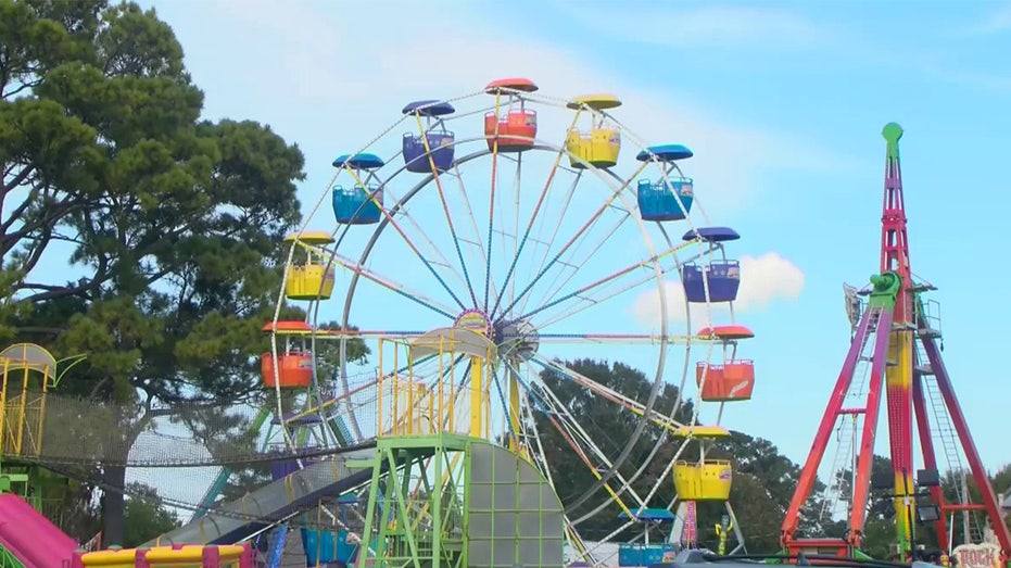Two girls hospitalized with injuries after falling from Ferris wheel at harvest festival