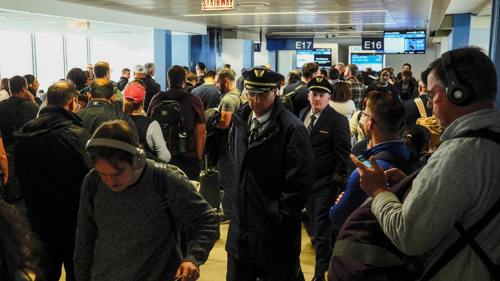 Flight reductions and delays could last another week, officials say