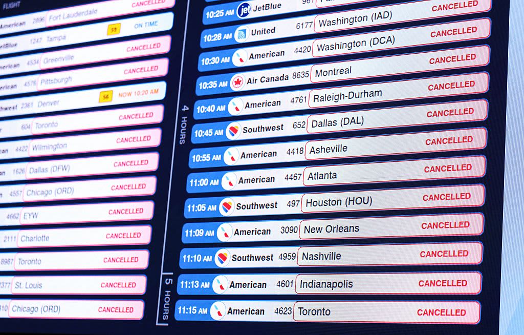 Flight disruptions from massive winter storm will linger Monday